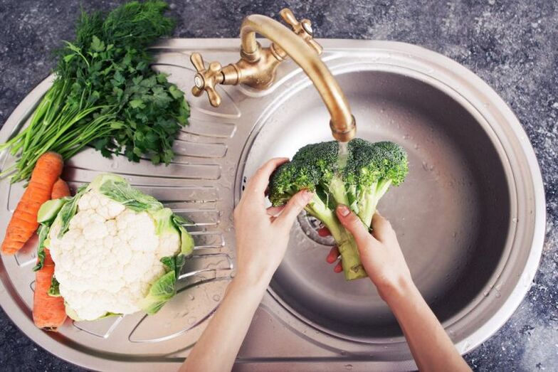 Washing vegetables to prevent worm infection